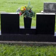 black double monument with vase