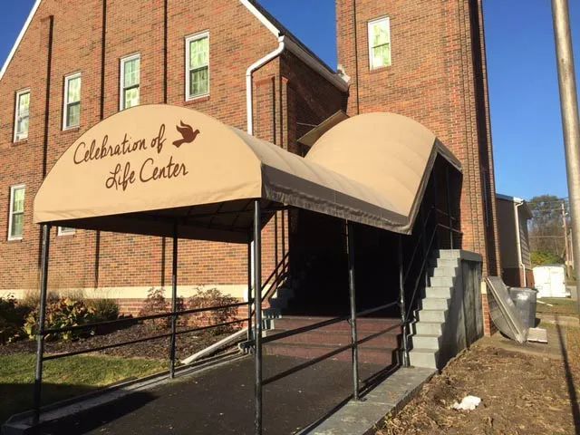 A canopy over the entrance to the celebration of life center.
