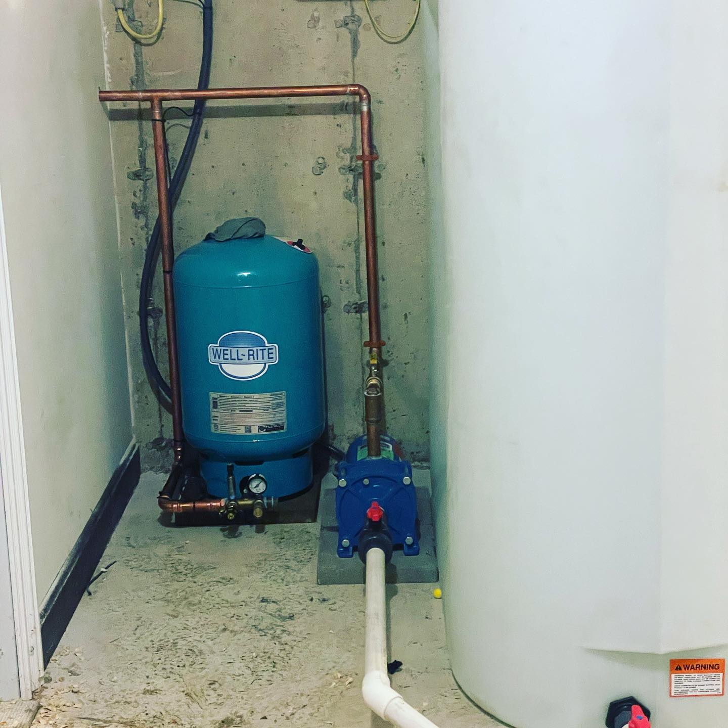 A blue water tank with the word fuel on it