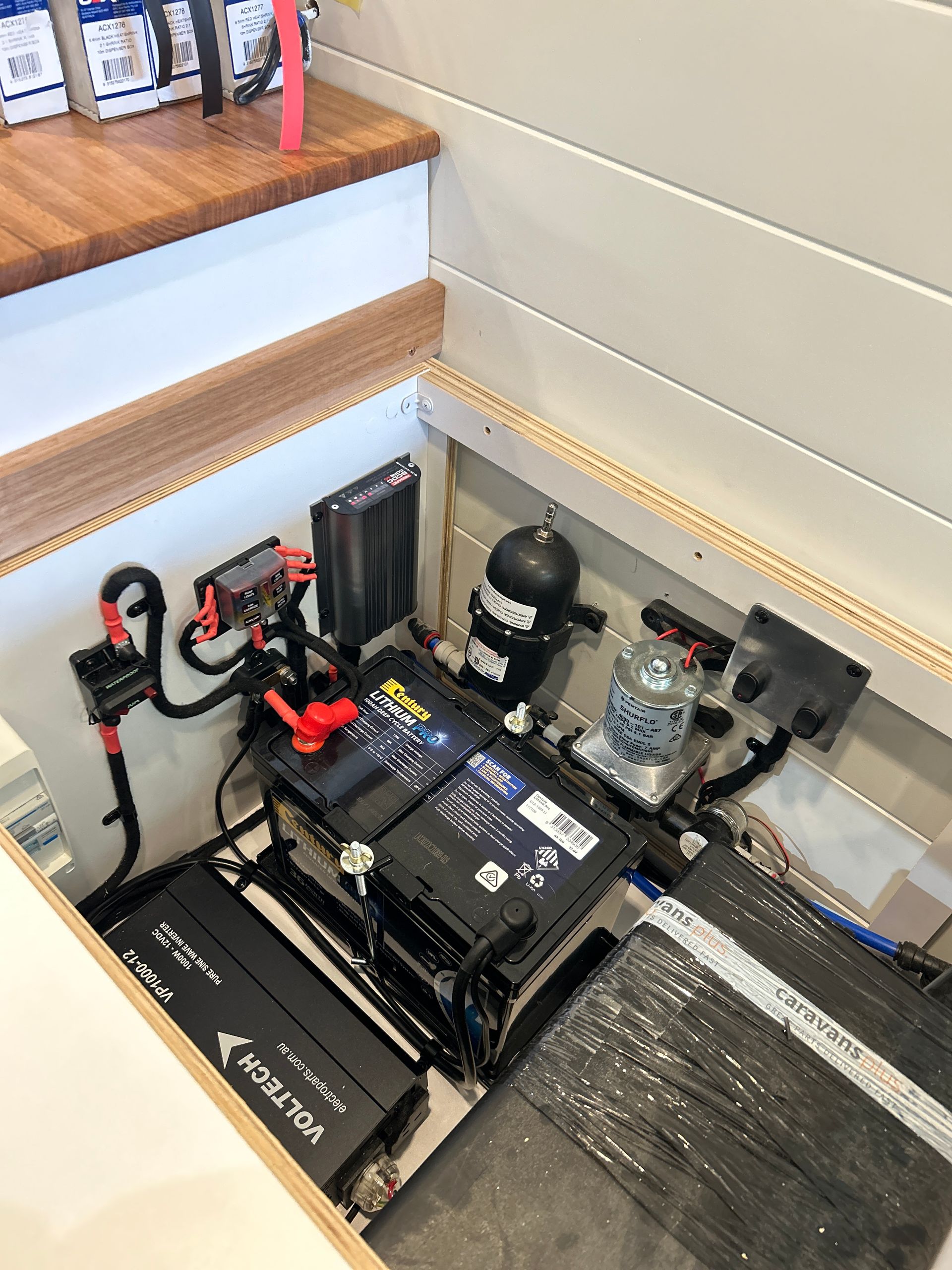 Electric set up under caravan seats — Scotts Auto Air & Electrical In Wollongong, NSW