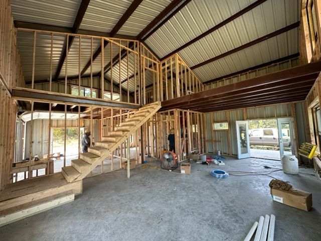 A house is being built with a staircase and a second floor.