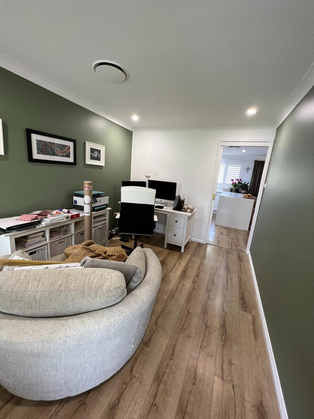 A Living Room With A Couch, Chair, Desk And Computer — Blue Painting & Decorating In Taylor, ACT