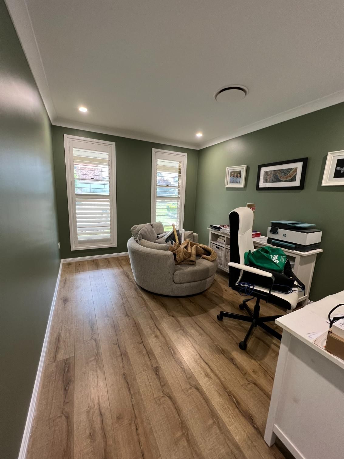 A Living Room With A Couch, Chair And Desk — Blue Painting & Decorating In Taylor, ACT