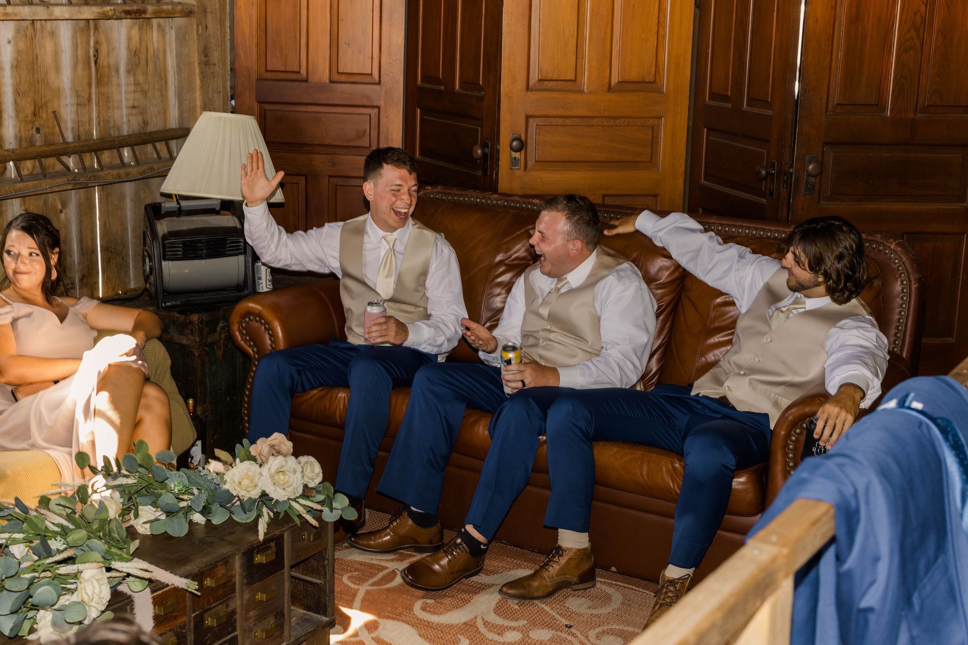groomsmen relaxing in their prep room