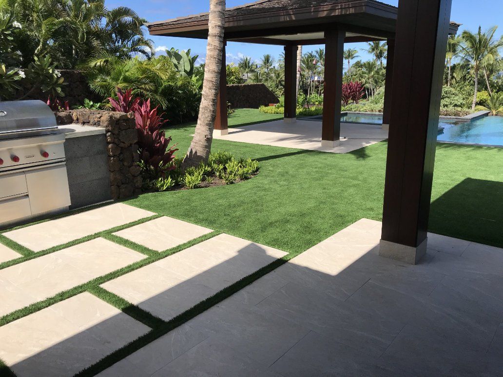 backyard with outdoor pavers. 