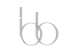 The letter b is surrounded by two circles on a white background.