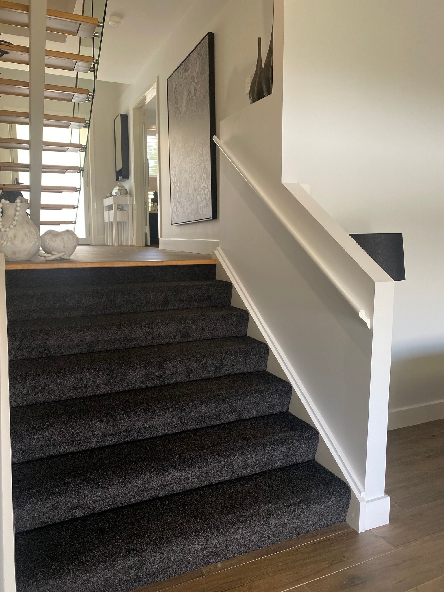Staircase With Dark Carpet and White Railing — BK Building Services Pty Ltd In Gloucester, NSW