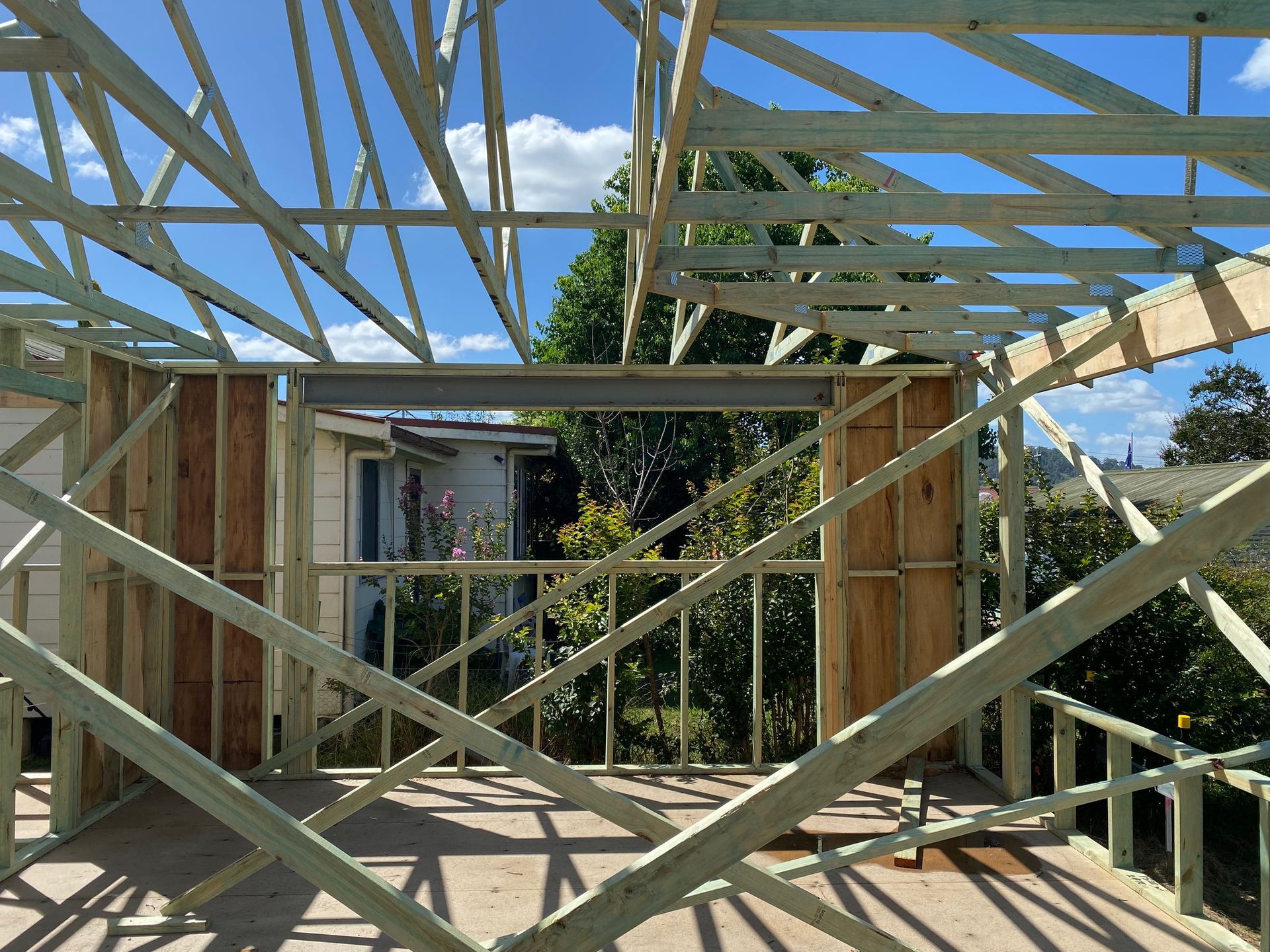Wooden Framework of a Building Under Construction — BK Building Services Pty Ltd In Taree, NSW