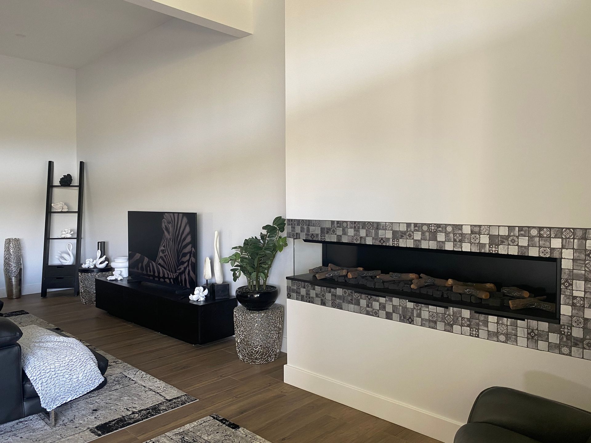 Modern Living Room With Decorative Items; Light Walls, Wooden Floor — BK Building Services Pty Ltd In Taree, NSW