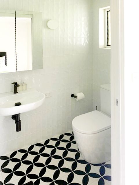 White and Black Tiled Bathroom With Sink and Toilet — BK Building Services Pty Ltd In Taree, NSW