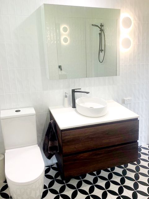 Bathroom With Dark Wood Vanity — BK Building Services Pty Ltd In Taree, NSW