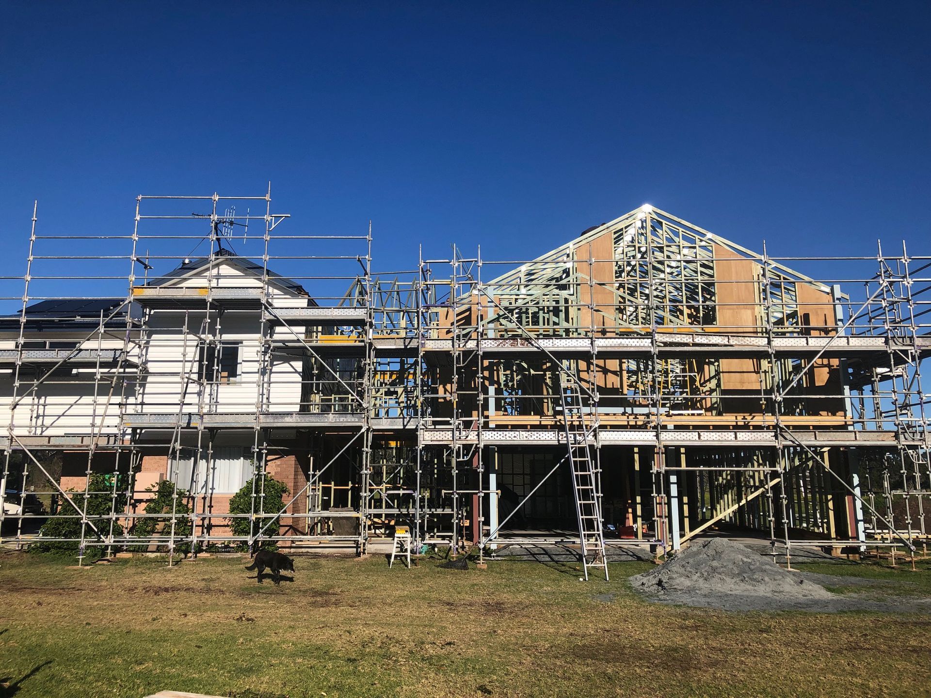 House Under Construction, With Scaffolding Surrounding the Exterior — BK Building Services Pty Ltd In Taree, NSW