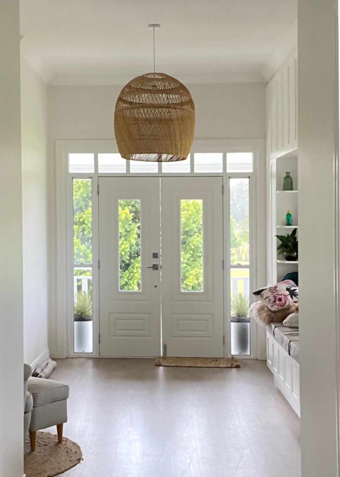 Bright Entry Hall With White Doors and Woven Light Fixture — BK Building Services Pty Ltd In Taree, NSW