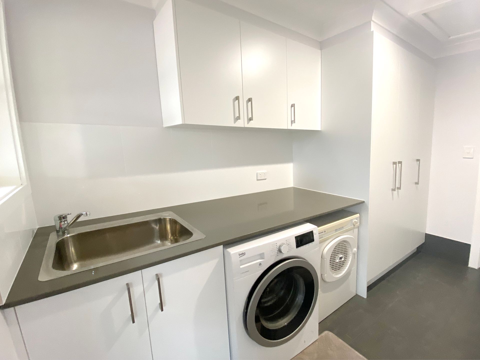 Laundry Room With Washing Machine — BK Building Services Pty Ltd In Taree, NSW