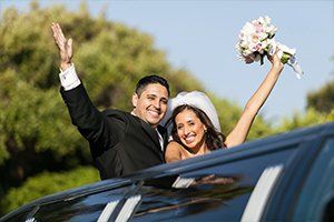 A couple using wedding limo services in Sausalito, CA