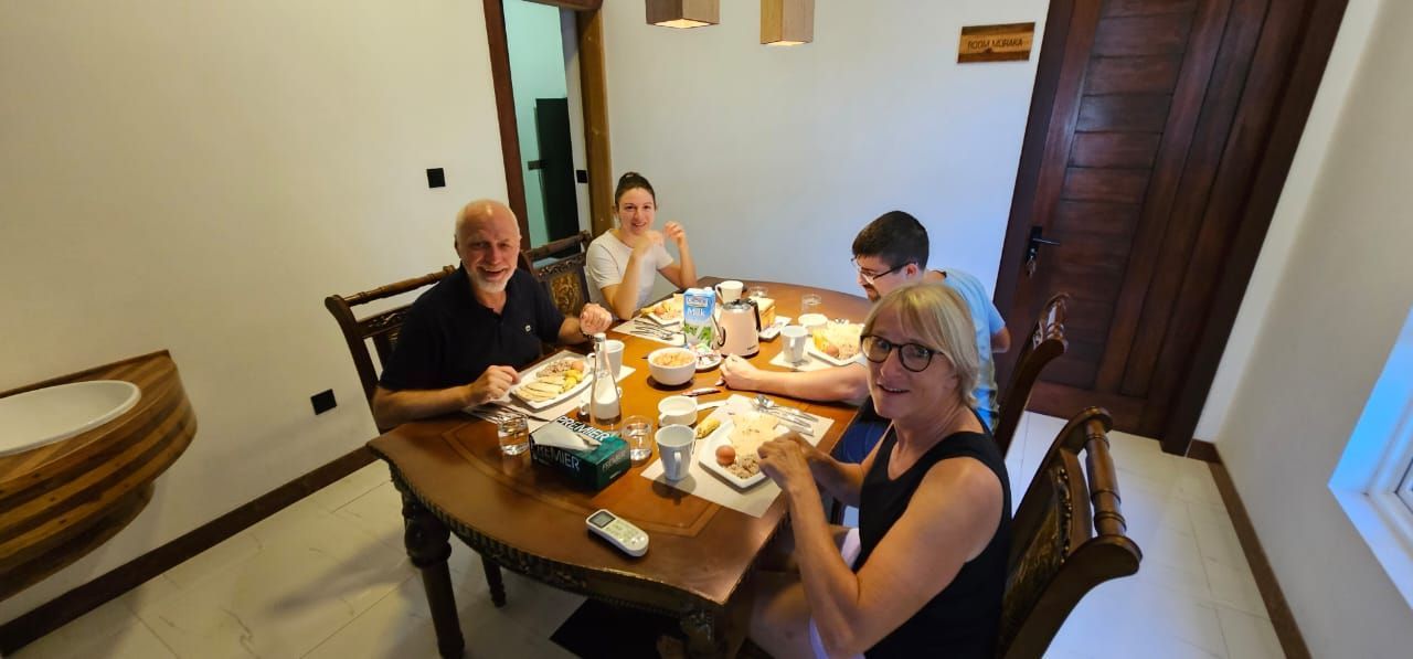 Family having dinner at Suncoral Maldives in Kondey during their Maldives Holiday in Gaafu Atoll 