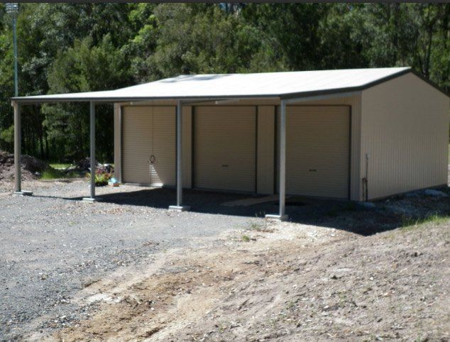 A Shed With A Porch Is Sitting In The Middle Of A Dirt Field – South Kempsey NSW - Fair Dinkum Builds Macleay Valley Sheds