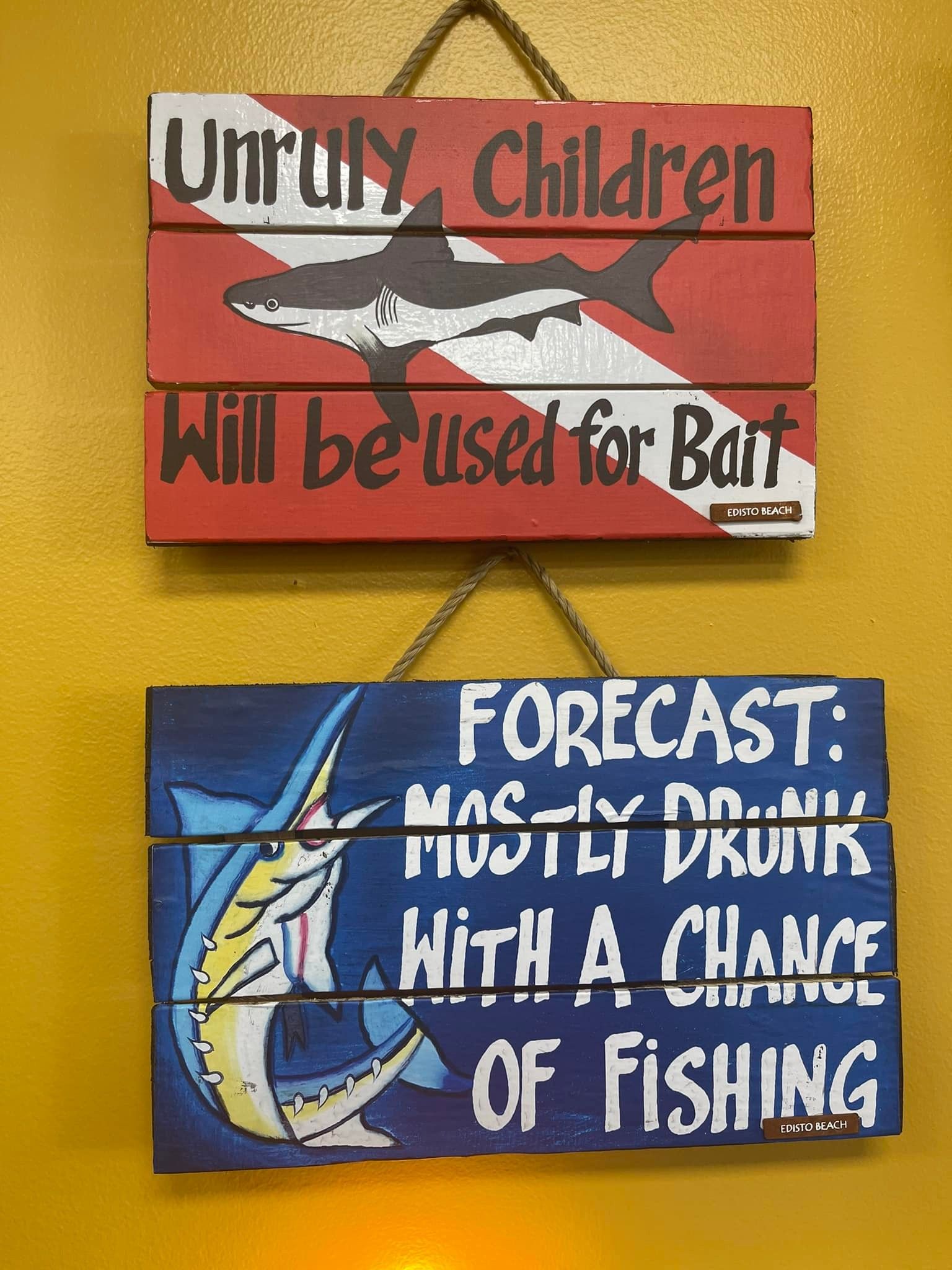 Two humorous fishing signs: 