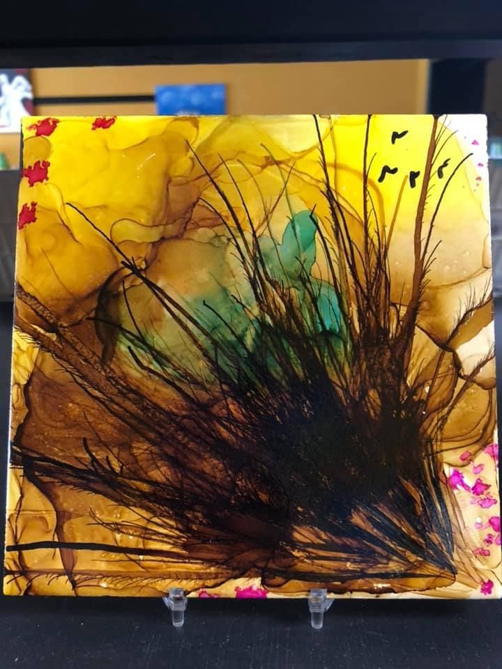 Abstract ink painting of tall grass in brown against yellow, with birds in the sky.