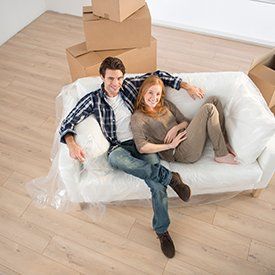 Couple moving into a new apartment