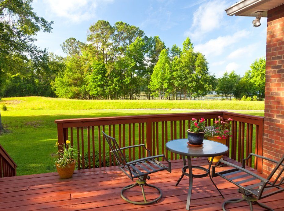 Decks — Residential Deck With Green Yard in Fayetteville, NC