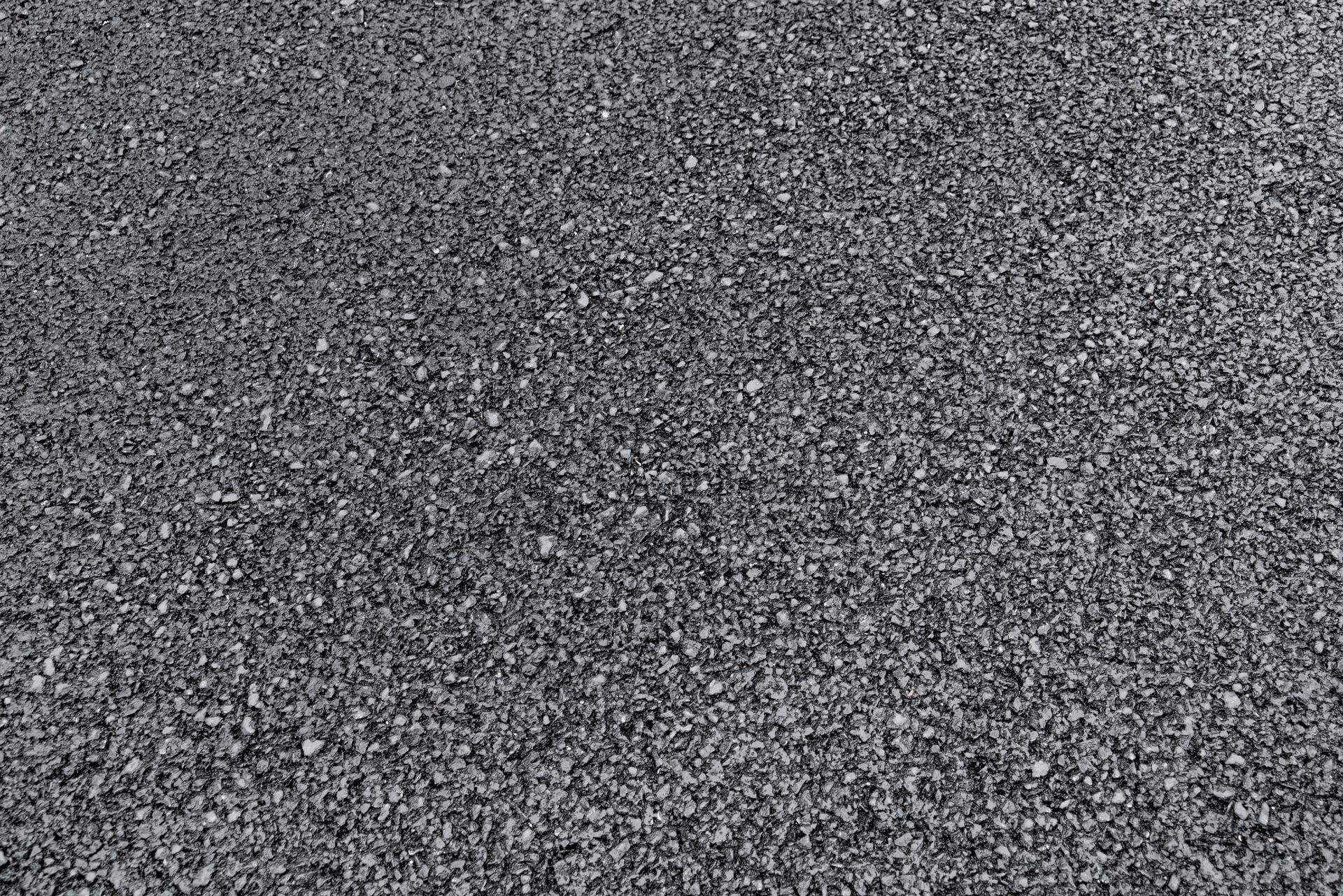 A close up of a pile of gravel on the ground.
