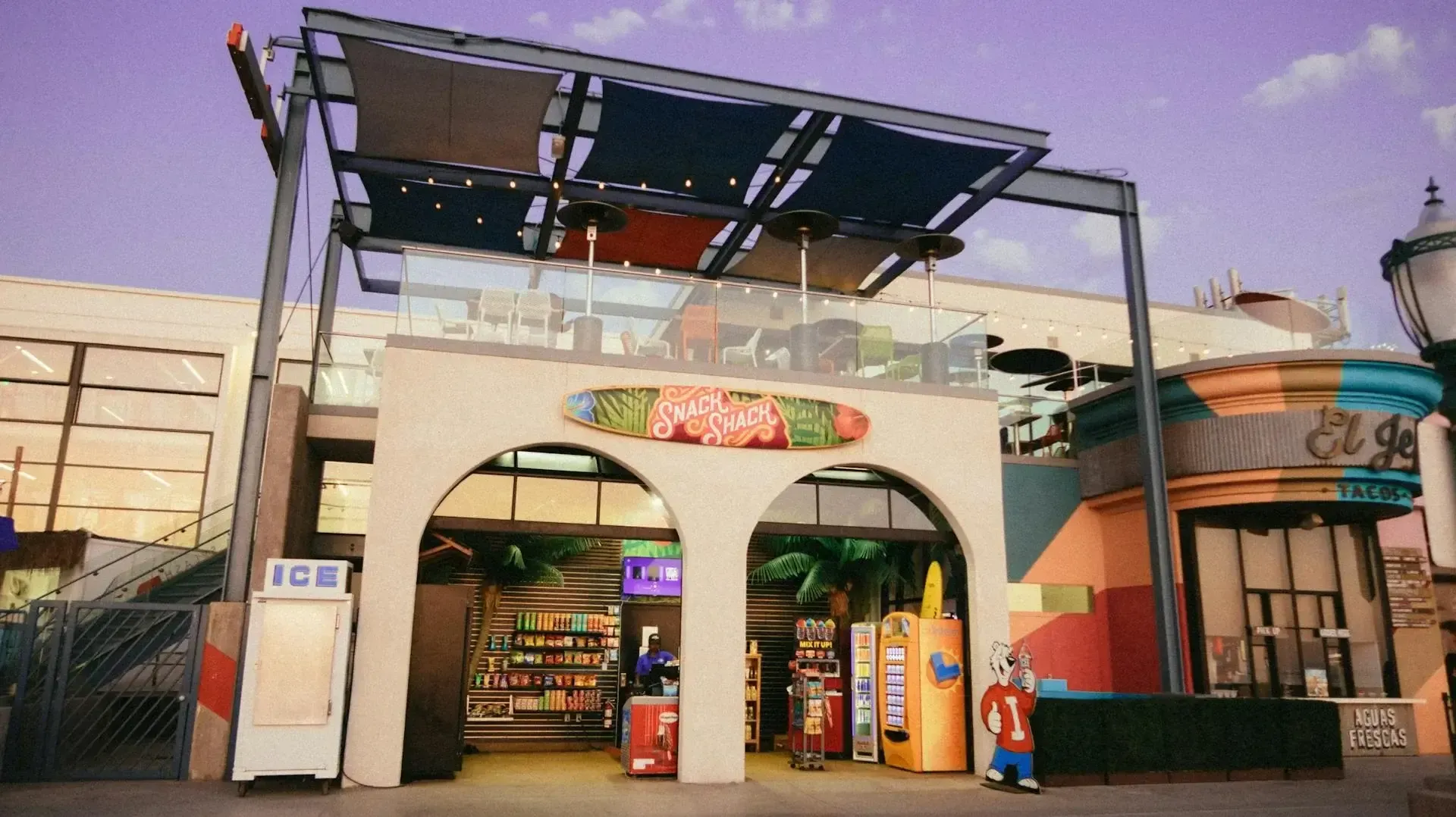 A store front with a sign that says ' el gato ' on it