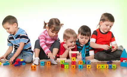 children playing puzzles