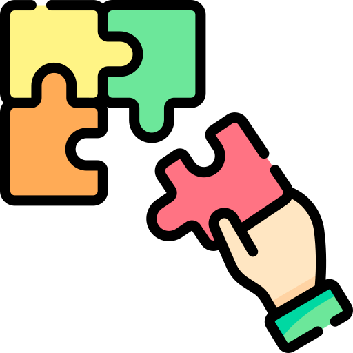 A hand is putting two puzzle pieces together.