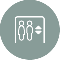 Elevator icon with two stick figures, one female and one male, inside. An up/down arrow is shown.