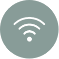 WiFi symbol in white on a muted green circle.