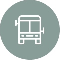 White bus icon in a teal circle.