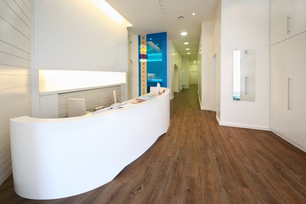 Lit reception area in dental clinic — R & M Electrical in Townsville, QLD