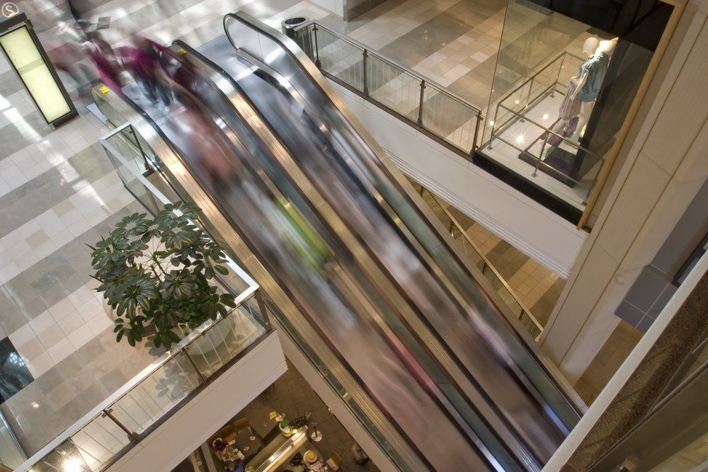 Electric Stairs in Shopping Center — R & M Electrical in Townsville, QLD