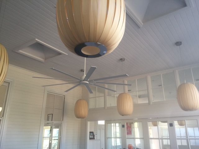 A large gray ceiling fan surrounded by lantern-style pendant lights — Channel Electrical In Swansea Heads, NSW