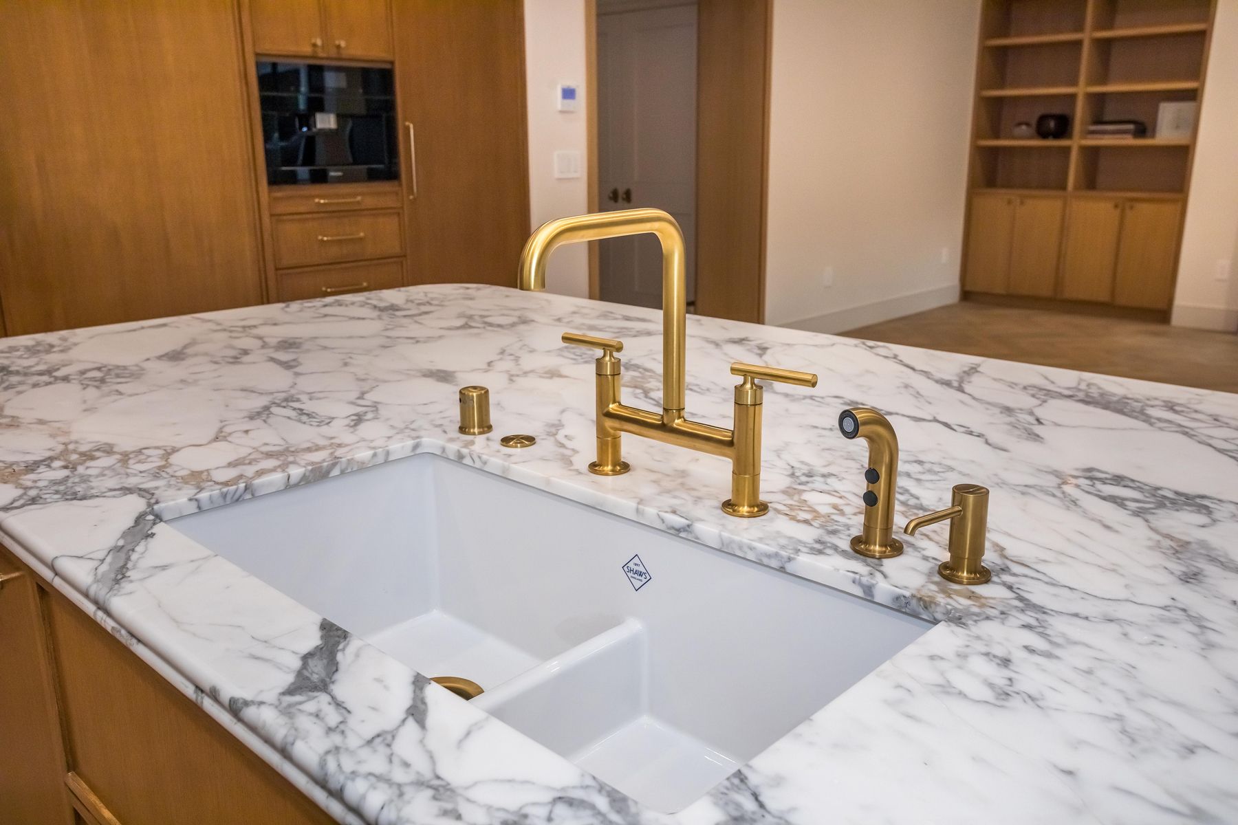 North Kenter avenue kitchen sink and gold kitchen fixture