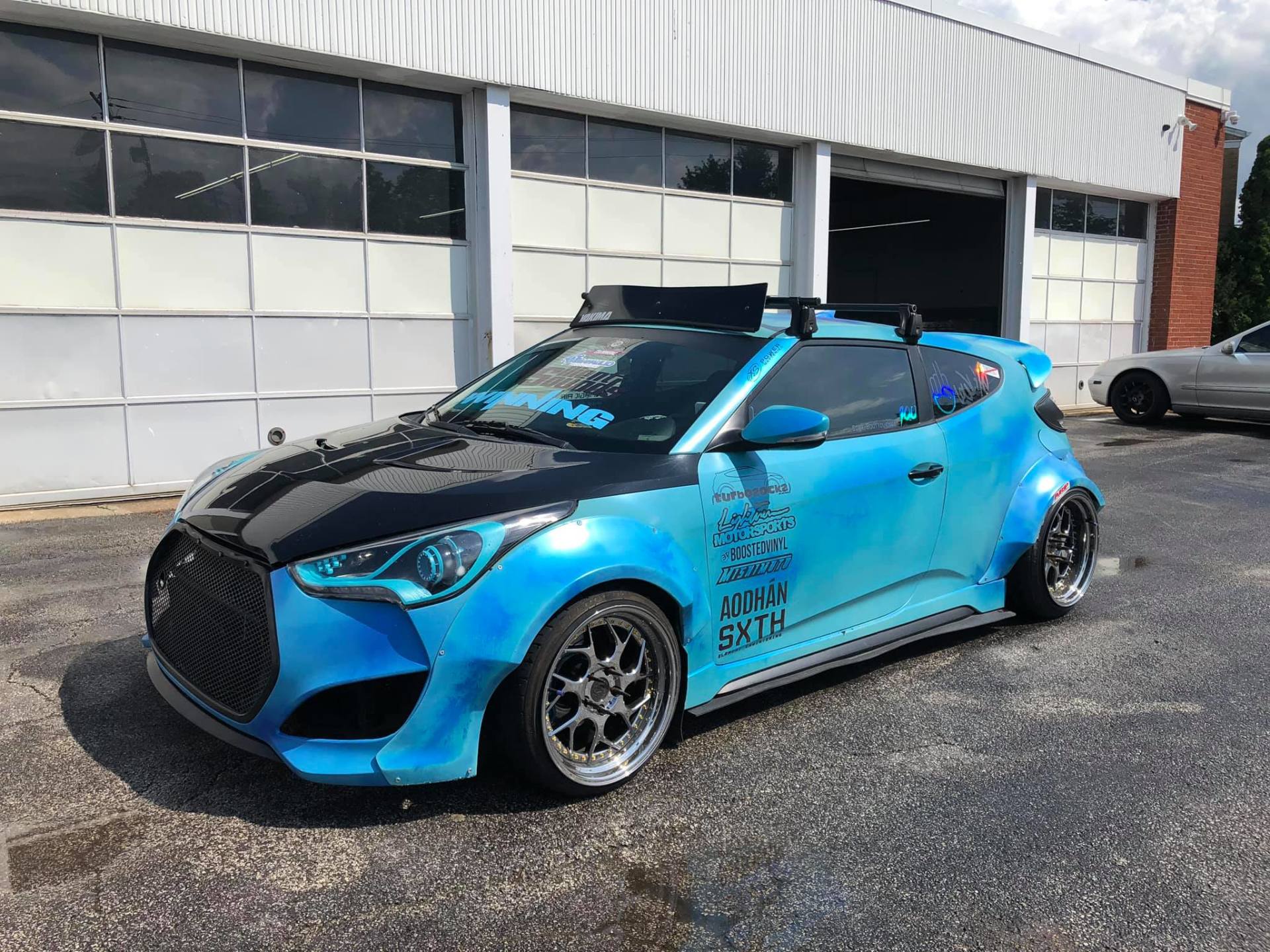 Blue Car with Wrap — Maple Heights, OH — Winning Window Tints