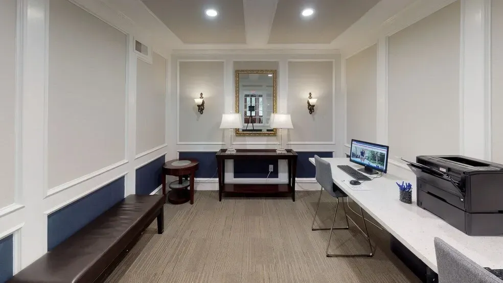 Business center with computers and printer