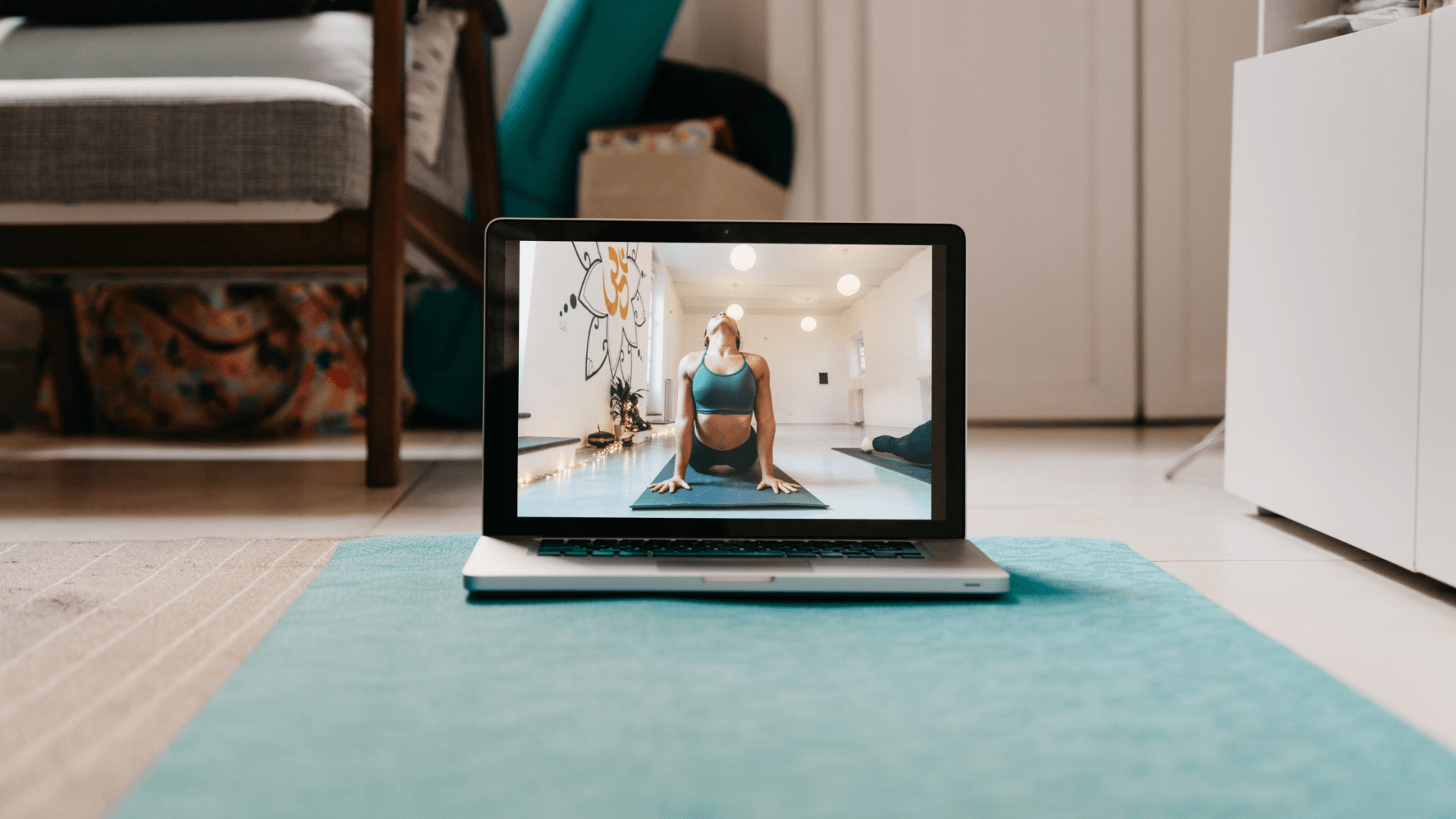Lady practicing yoga online