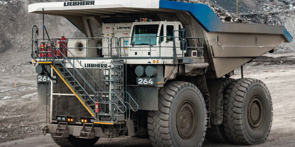 heavy duty mining vehicle showing off titanvolt batteries on the gsn360 site