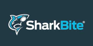 A shark bite logo with a shark on a blue background.