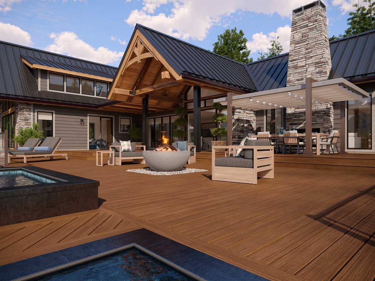 Trex® Decking from Budget Home Supply Colorado - Exterior of a modern home with a deck, hot tubs, outdoor seating, and a fire pit.