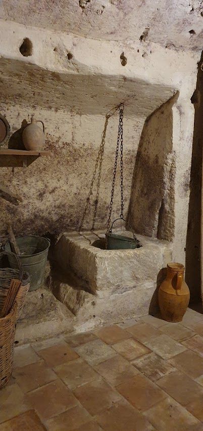 There is a well in the middle of the room.