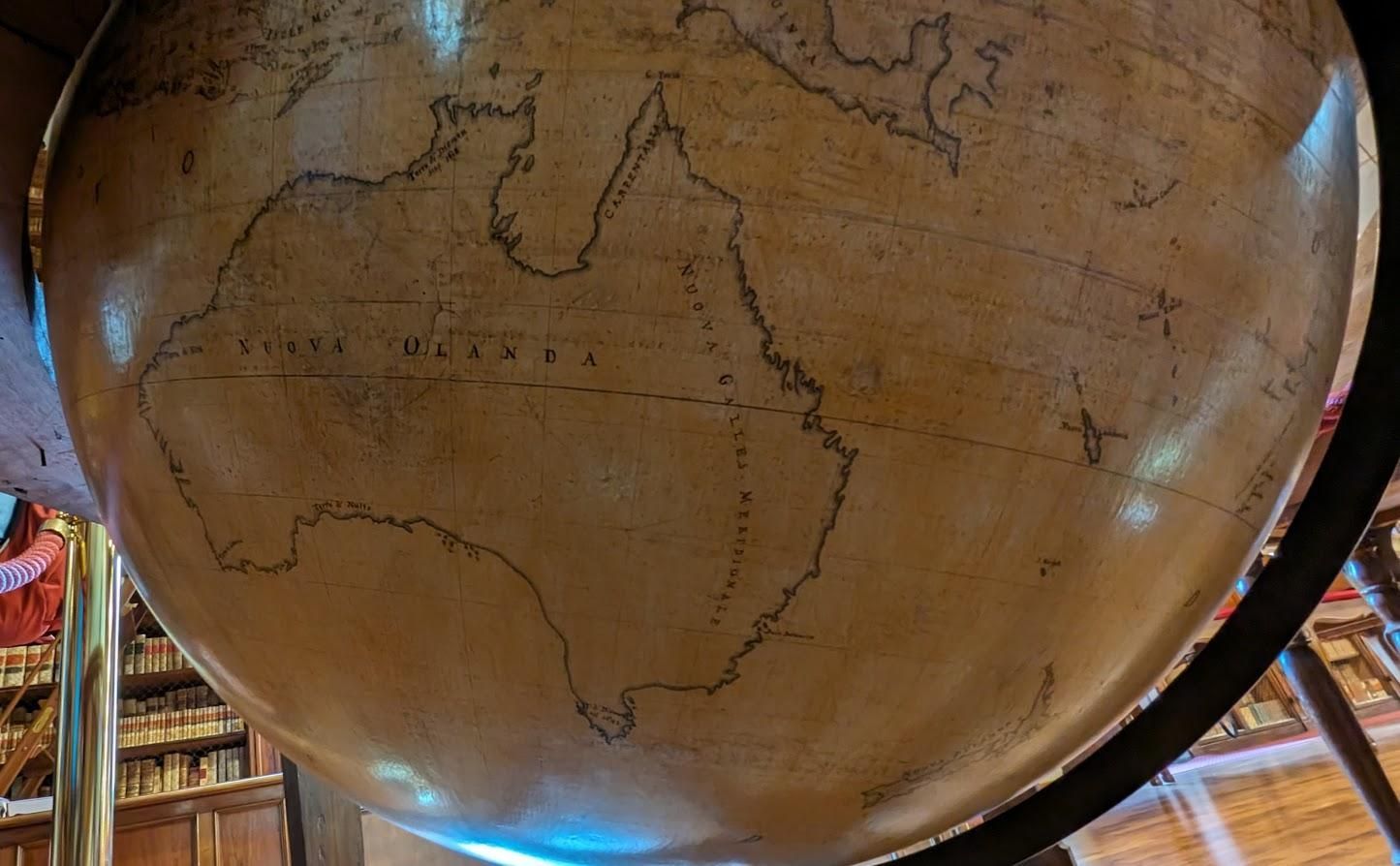 A globe with a map of australia on it
