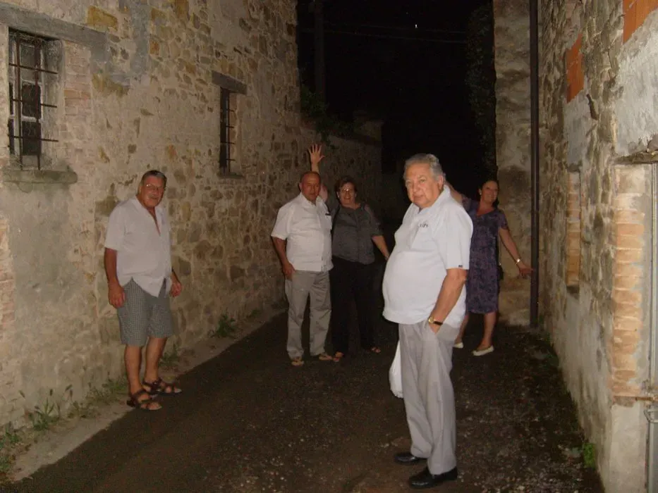 Evening stroll through a stone alley.