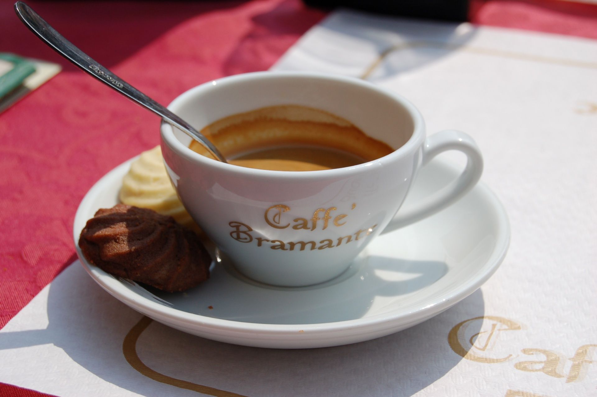 A Caffè, or short black, is often served in Italy with some yummy biscuits or a small chocolate!