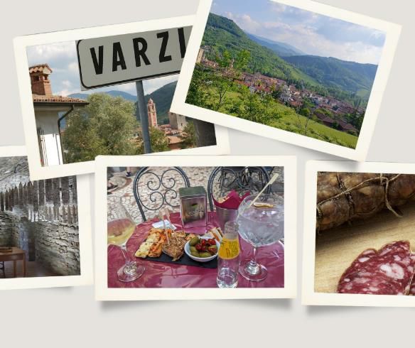 A collage of Varzi, Italy, featuring a town sign, a panoramic hillside view, an ancient stone corridor, local aperitivo, and traditional salami.