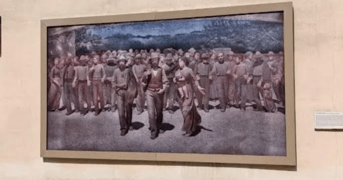 Framed reproduction of 'Il Quarto Stato' depicting a workers' march.