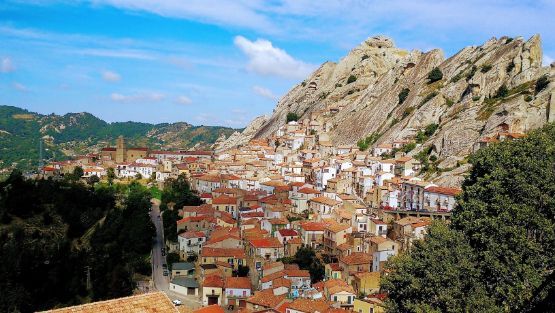 An aerial view of a small town on top of a mountain.