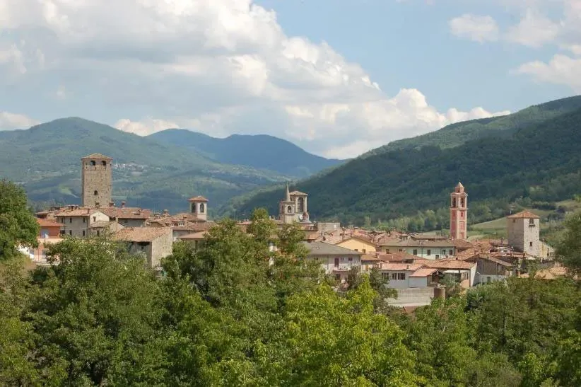 Tucked between the hills, a timeless village waits to charm you.